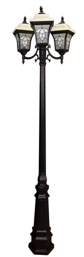 This decorative outdoor light lamp post fixture incorporates several different concepts to create an individual style. Each fixture has an Alabaster-like glass lid, stained glass panels and sculptured cast aluminum arms and cage. These cast aluminum fixtures emit a warm and attractive glow that provides ample light for any entrance, porch, deck or business front. Black Lamp Post with Leaded Stained Glass.